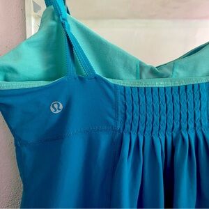 Lululemon tank top with built in support, no pads. Never worn, no tags. Size 10